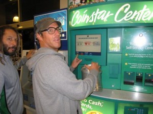 Customer using a Coinstar Center