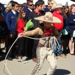 A young boy shows off his lasso skills at Ag Day