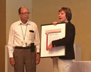 CDFA Secretary Karen Ross presents a proclamation to Nirmal Saini in honor of his 41 years of public service.