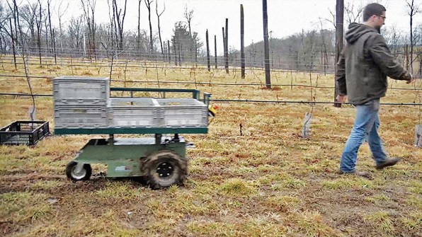 Robotic wheelbarrow follows a farmer