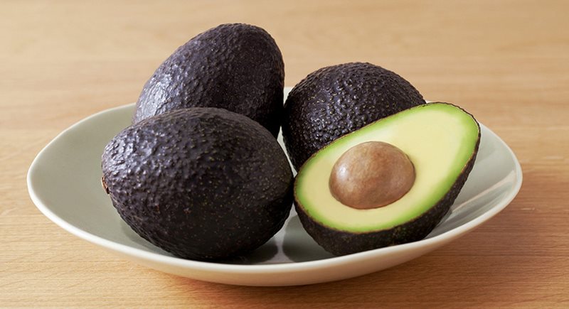 Photo of four avocados. 